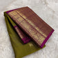 Authentic Kancheepuram silk saree with forest olive body and vivid rani magenta Yazhi border detailing