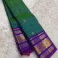 peacock green Kanchipuram silk saree with zk-yb weave folded view