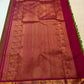 Pachai Green Kanjivaram saree with handwoven silk thread buttas detail