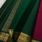 Pure Kanchipuram silk saree spread view showing green and deep pink sections with gold zari border, available in the USA