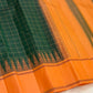 Forest green and orange Kanjipuram silk saree folded showing Kanchi Kattam body and contrast orange border
