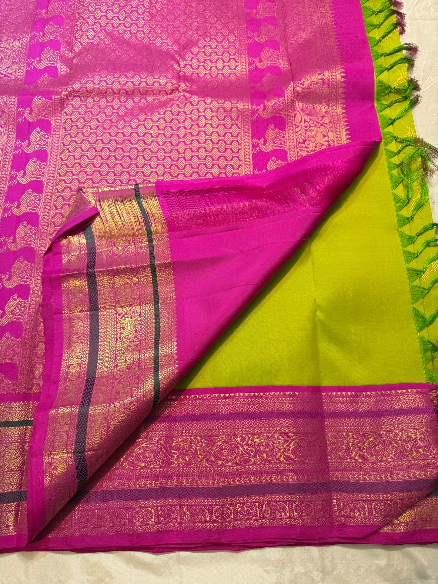 Dense gold zari pallu panels on parrot green butta Kanjeevaram silk saree — Idam Living