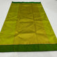 Close-up of the wide Forest Green silk border with fine gold edging on a Lime Green Pattu Silk Chanderi saree