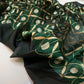 Gold leaf motifs woven across deep green Pattu Silk Chanderi