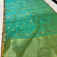 Sea Green Chanderi saree border detail showing the slim antique-gold woven edge