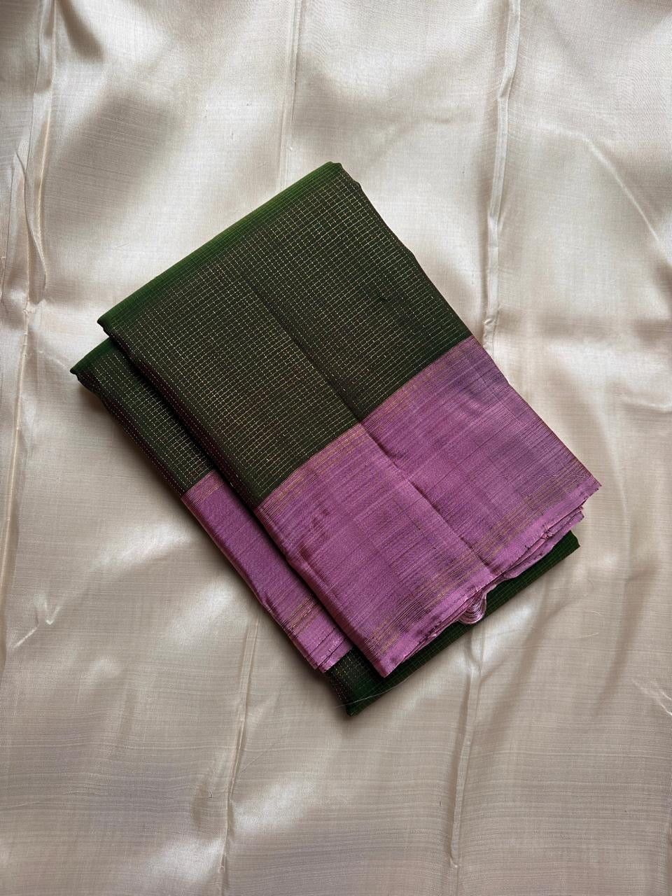 folded lavender and green kattam pure kanchipuram silk saree with zari border