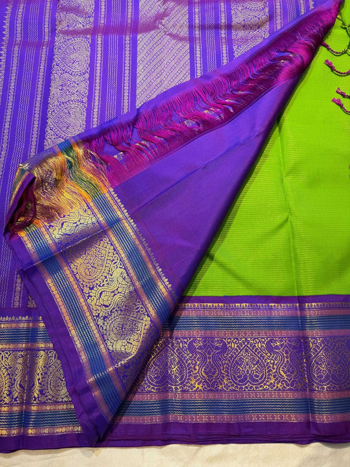 Royal Purple Korvai pallu with antique-gold paisley-inspired zari motifs.