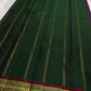 Close view of green pure Kanchipuram silk saree border with antique gold zari detailing and maroon edge finish, shipped from New Jersey USA