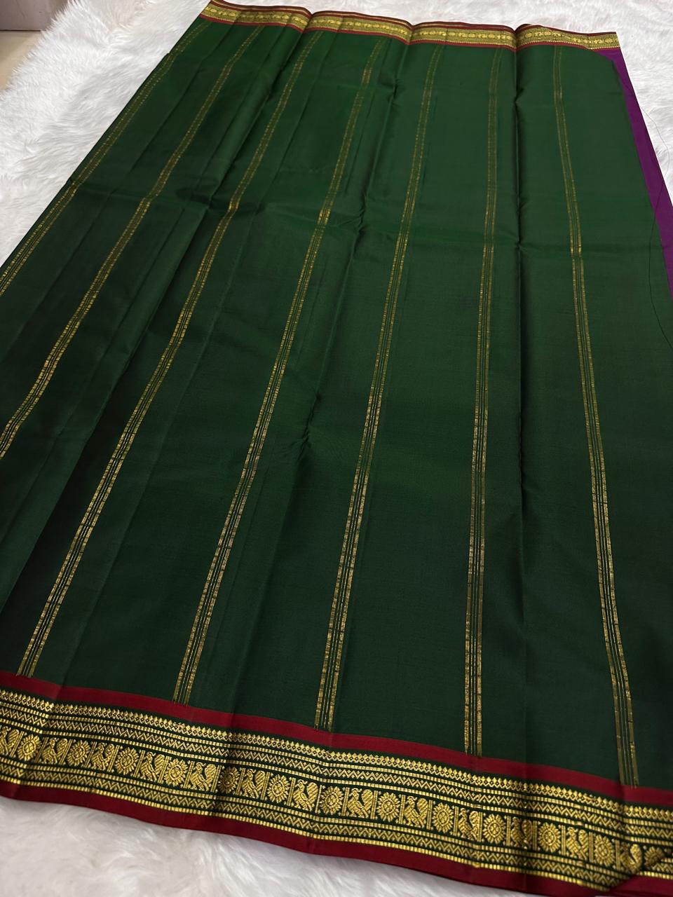 Close view of green pure Kanchipuram silk saree border with antique gold zari detailing and maroon edge finish, shipped from New Jersey USA