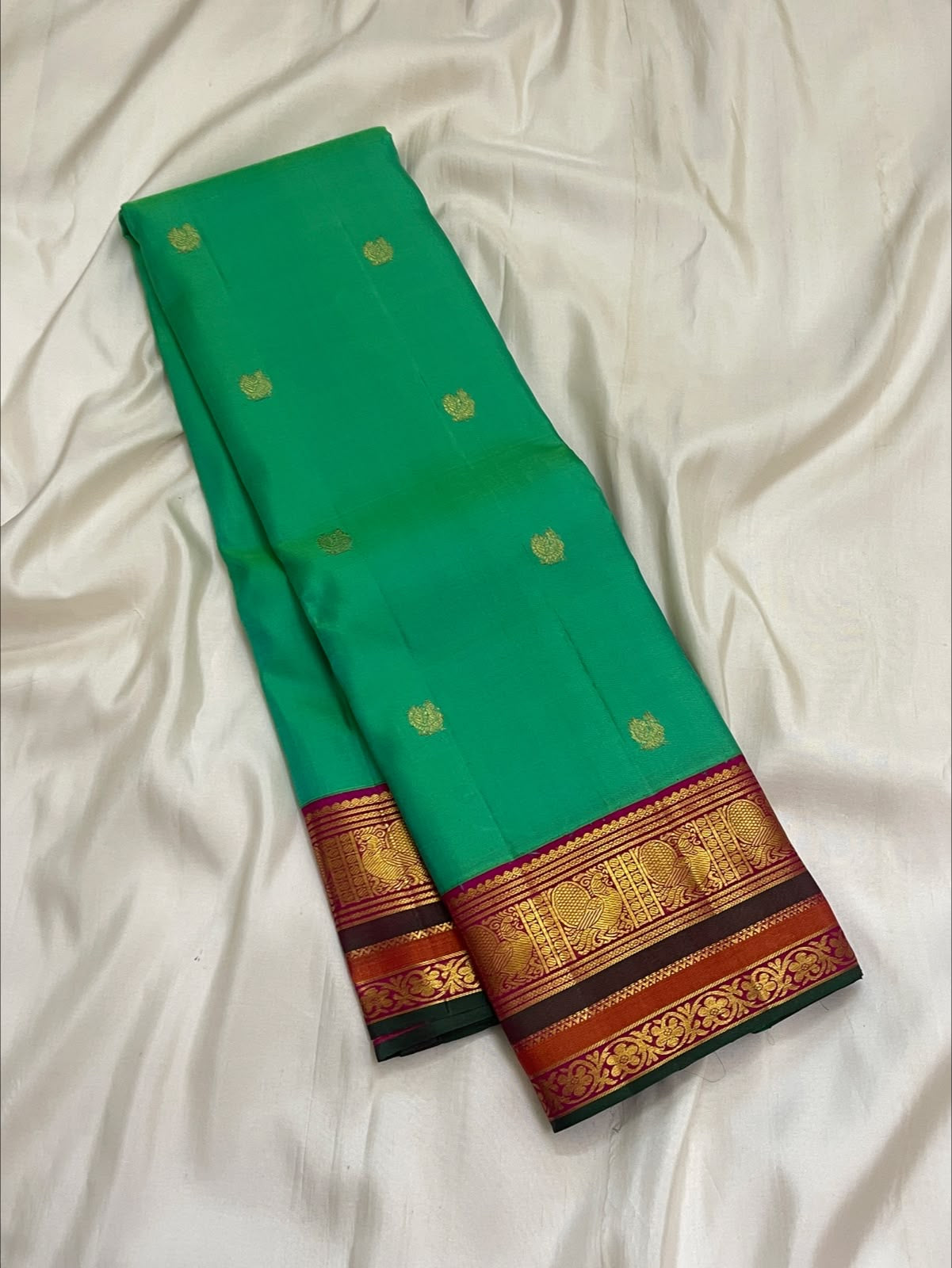Emerald Aqua Green Shot-Colour Handwoven Pure Silk Kanchi Pattu Korvai Saree with Gold Zari Buttas and Raspberry Pink Pallu