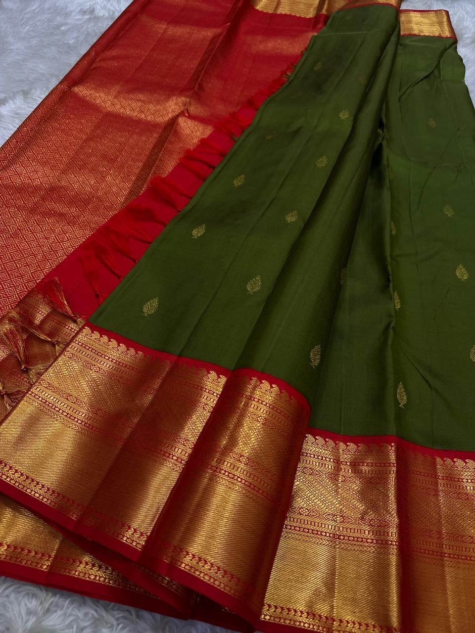 Olive Green and Arakku Red Korvai Kancheepuram silk saree.