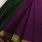 Folded purple end of pure Kanchipuram silk saree showing smooth silk surface and petite antique gold zari border