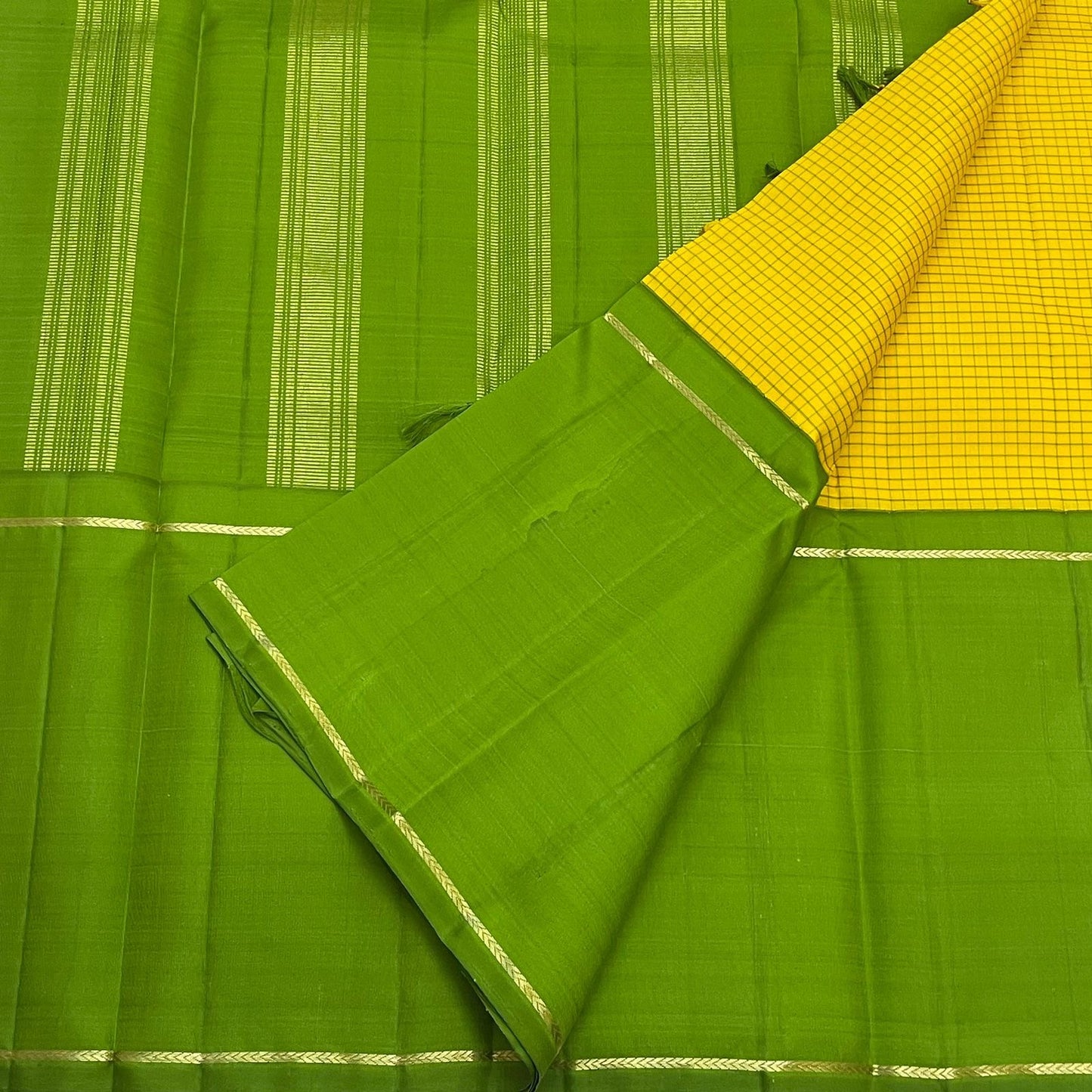 Flat-lay green and yellow checked Pure Kanchipuram silk saree with zari woven stripes, shipped from New Jersey USA