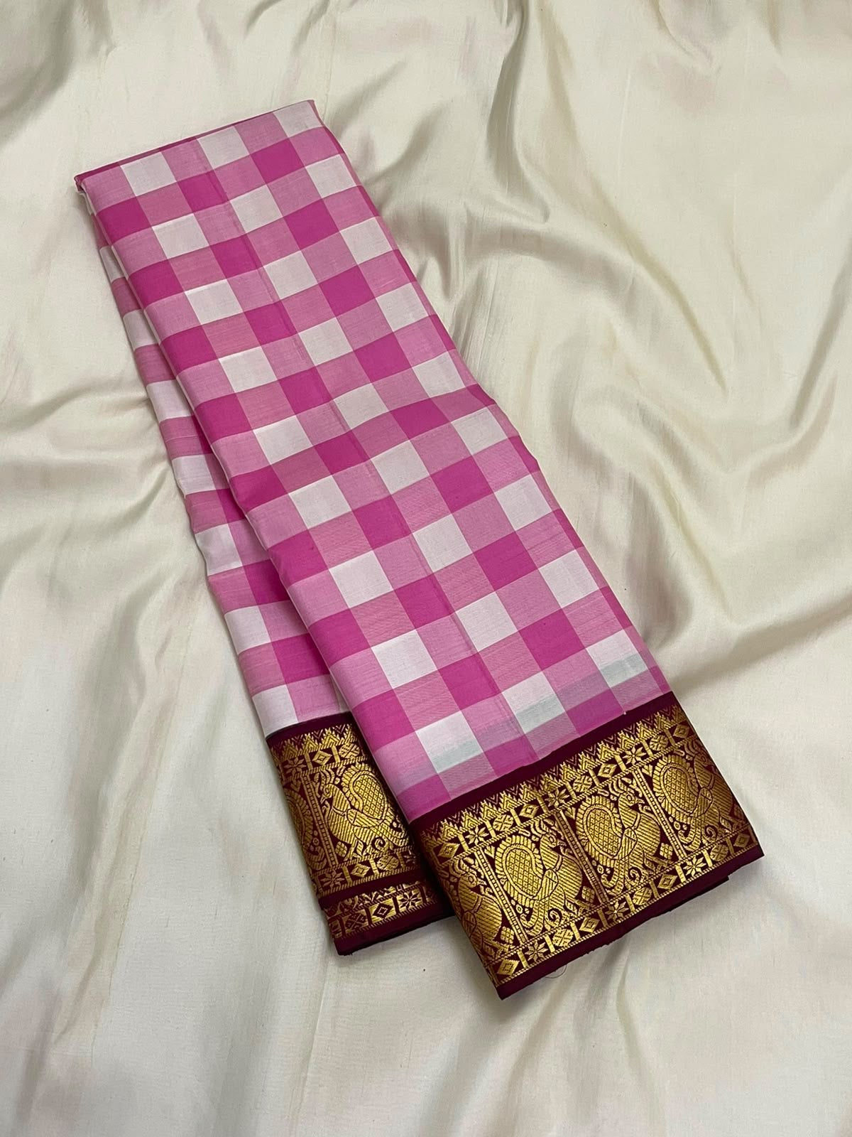 Traditional gold zari border on pink checked Pure Silk saree