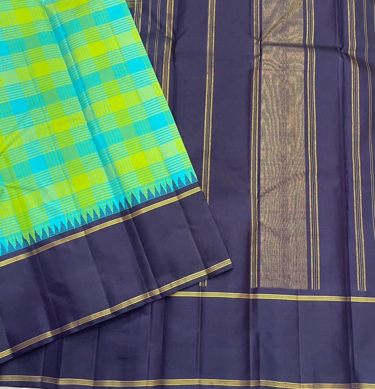 Green Teal Paalum Pazhamum Kanjeevaram Silk Saree with Pillayar Reku and Navy Border