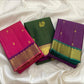 Close view of Vairaoosi lines and gold zari buttas on deep green silk