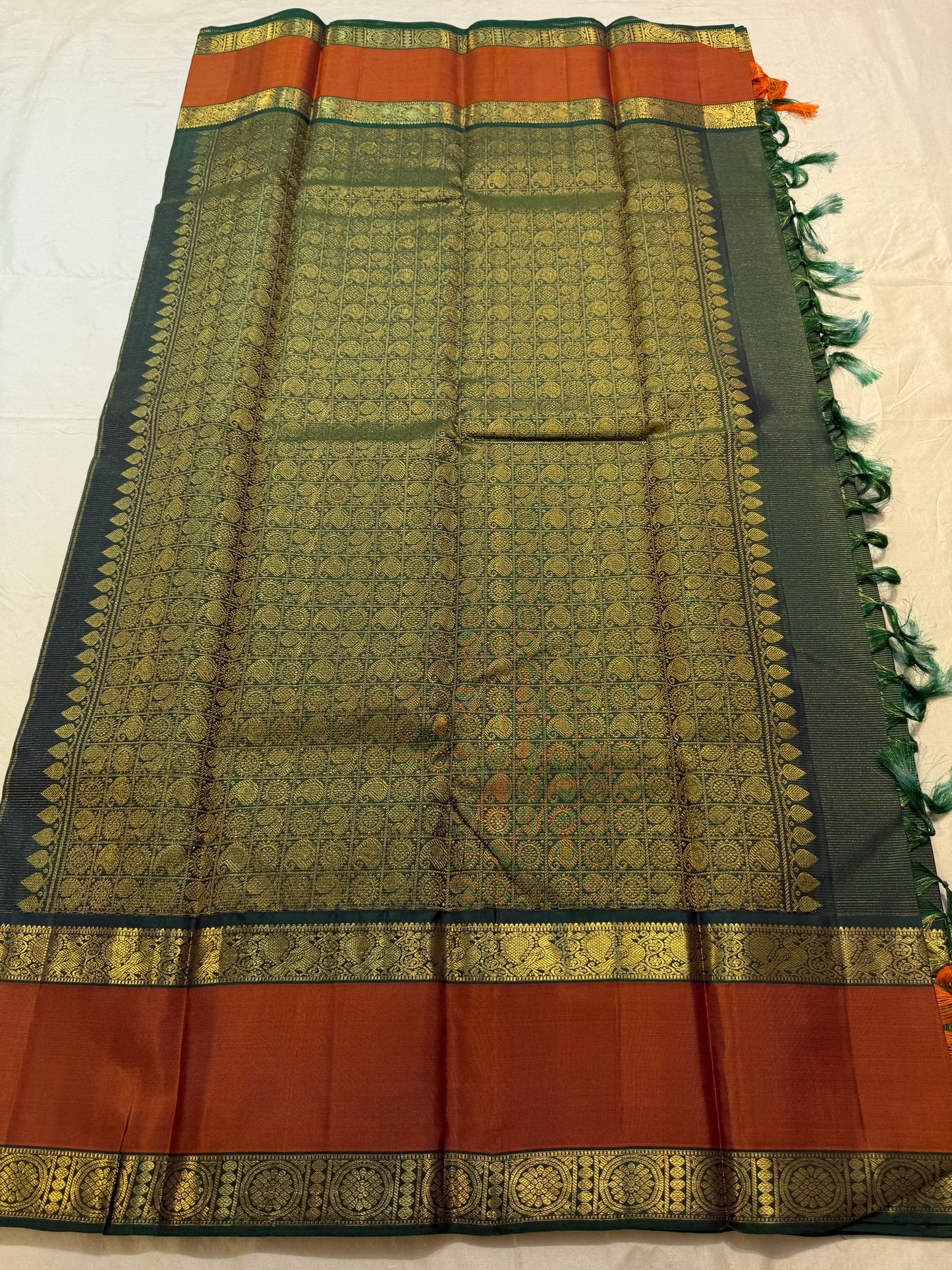 Bottle green vairaoosi Kanchipuram silk saree with gold zari maanga and mayil butta body — Idam Living