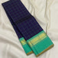 Long fold view of navy grid checked Pure Kanchipuram silk saree with sea green and gold zari woven border