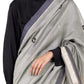 Grey Chanderi saree showing luminous silver metallic pallu