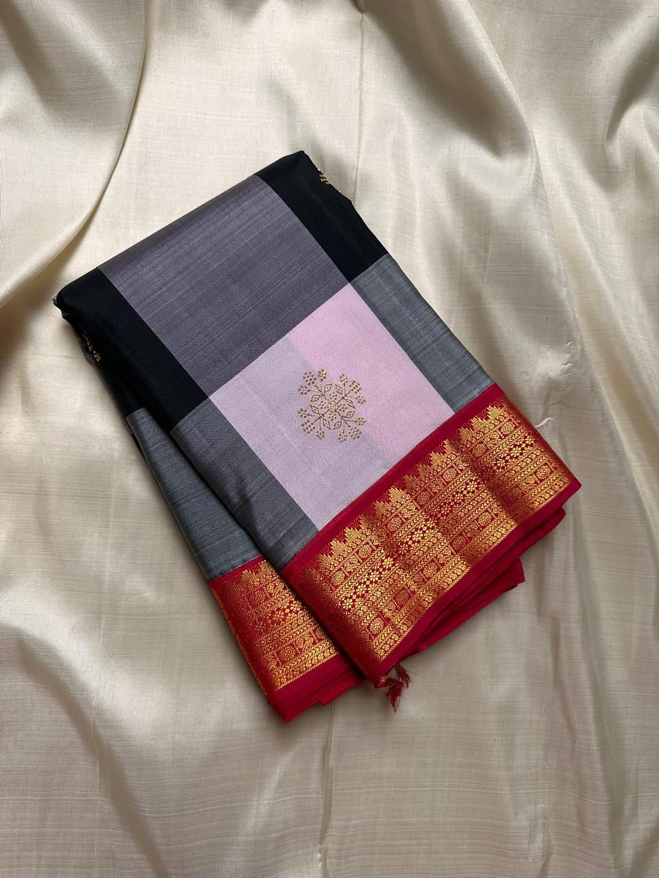Folded Pure Kanchipuram Silk Saree with charcoal and lilac checked body, gold motif, and red zari woven border