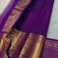 Close view of vibrant purple pallu with gold zari pattern and tassels, shipped from New Jersey USA