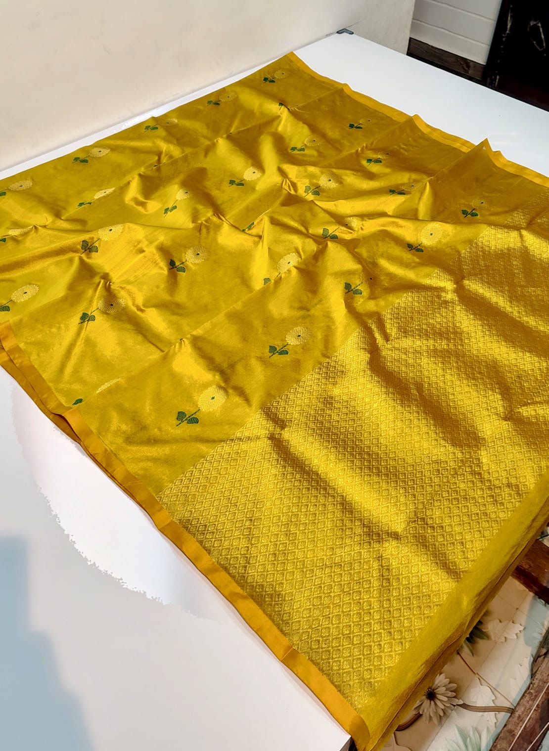 Turmeric yellow Chanderi with green-accented floral motifs