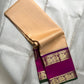 Handloom Kanchipuram saree pink border closeup — warm ivory beige Kanchipattu silk — Idam Living