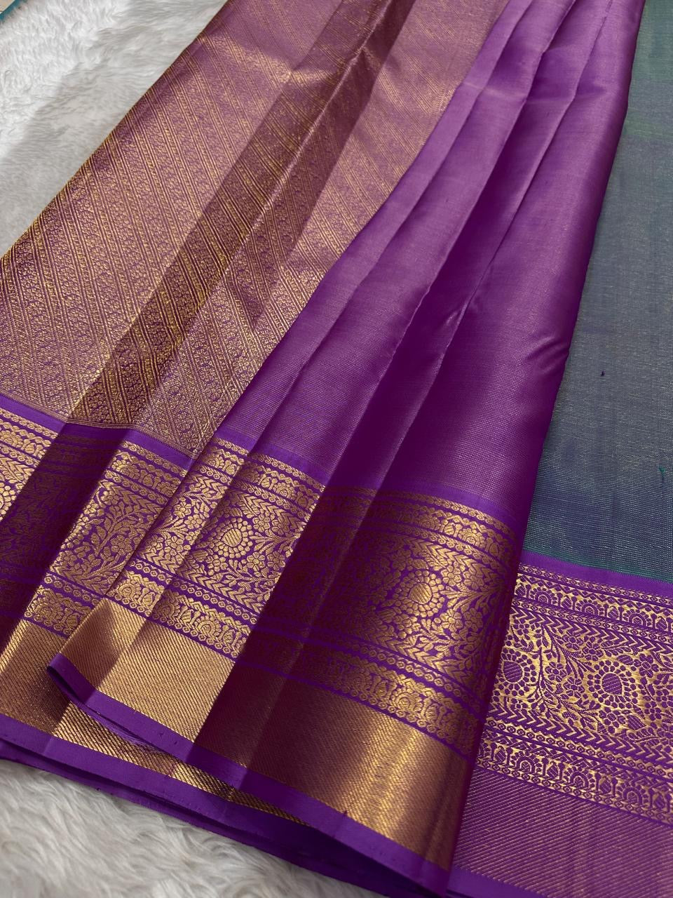 Pastel Mint Green and Royal Orchid Purple Handwoven Pure Silk Kanchipuram Saree with Vairaoosi Korvai Border and Mayil Chakram Butta