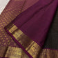Close-up of magenta pallu with fine zari lines and gold zari border on pure Kanchipuram silk saree