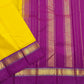 Full spread pure Kanchipuram silk saree with yellow body and purple striped pallu, available in the USA