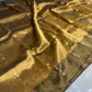 Antique Gold handloom Tissue Silk Chanderi saree body detail with spaced metallic buttas on a sheer luminous ground