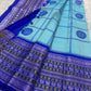 Full view of the aqua body and cobalt pattupet border.
