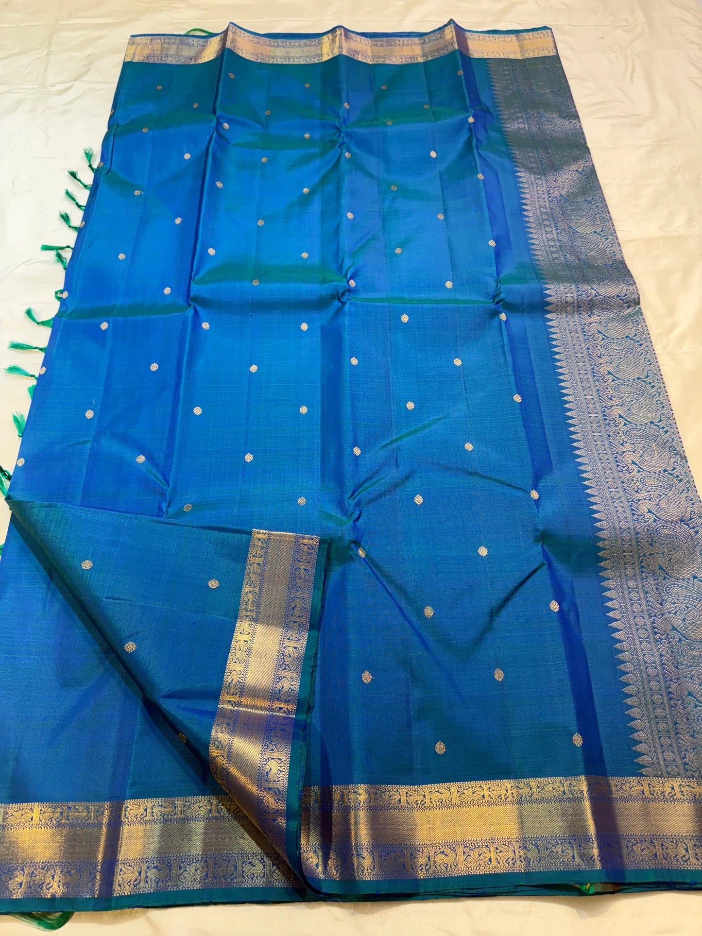 Handwoven peacock blue KanchiPattu silk saree detail, Silk Mark certified