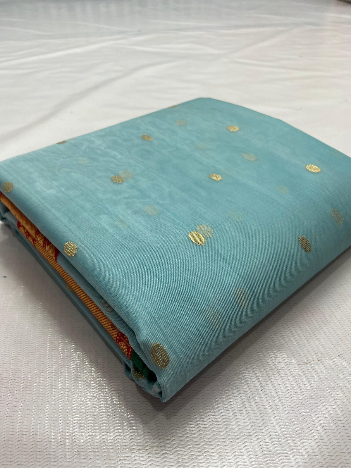 Handwoven blue Chanderi saree with broad gold-toned border
