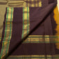 Circular gold medallions within the traditional border.