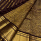 Handwoven Butta weave detail of the deep cinnamon brown Kanchipuram silk saree with Vanasringaram floral jaal