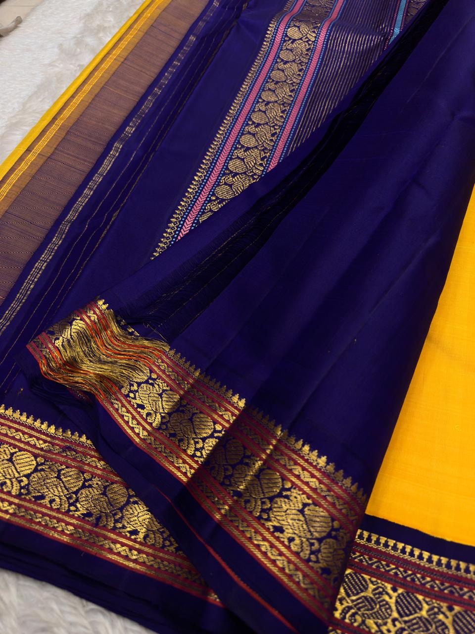 Canary Yellow and Violet Korvai Kanchi Pattu Silk Saree with Maanga Butta and Yaanai Border