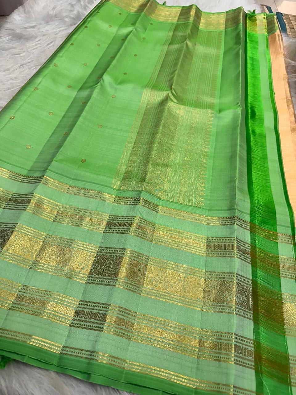 Champagne Peach Handwoven Pure Silk KanchiPattu Saree with Varisaipet Weave and Mint Green Zari Border