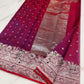 Full-length drape of a berry red Chanderi Katan Silk saree with ornate silver-rose floral border
