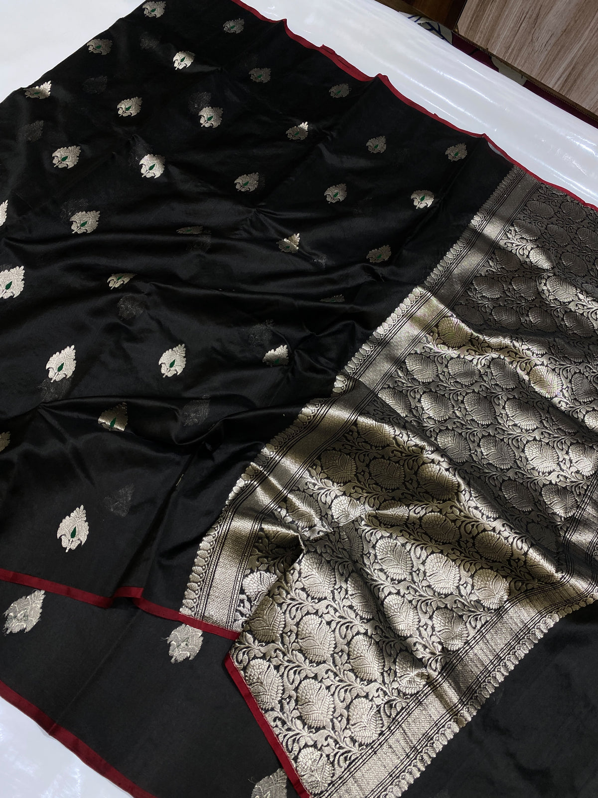 Detail of the light, airy weave on a midnight black Chanderi Pattu Silk saree