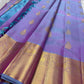 Handwoven double-shot Butta Kanchipuram silk saree, folded