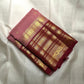 Dusty rose Kanchi Pattu saree draped, showing Varisaipet body weave