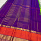 Handwoven elam pachai green Kanchipuram silk varisaipet saree.