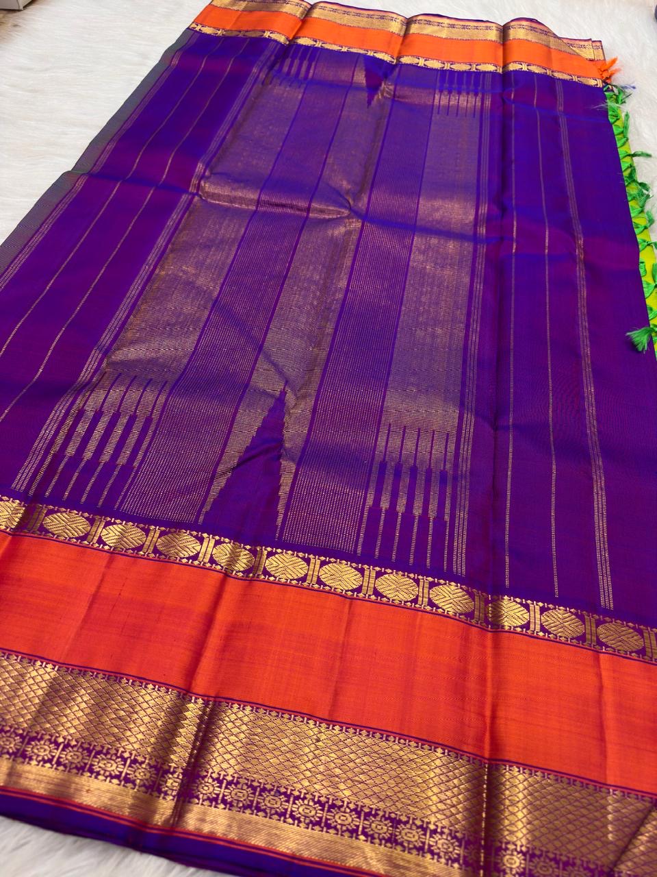 Handwoven elam pachai green Kanchipuram silk varisaipet saree.