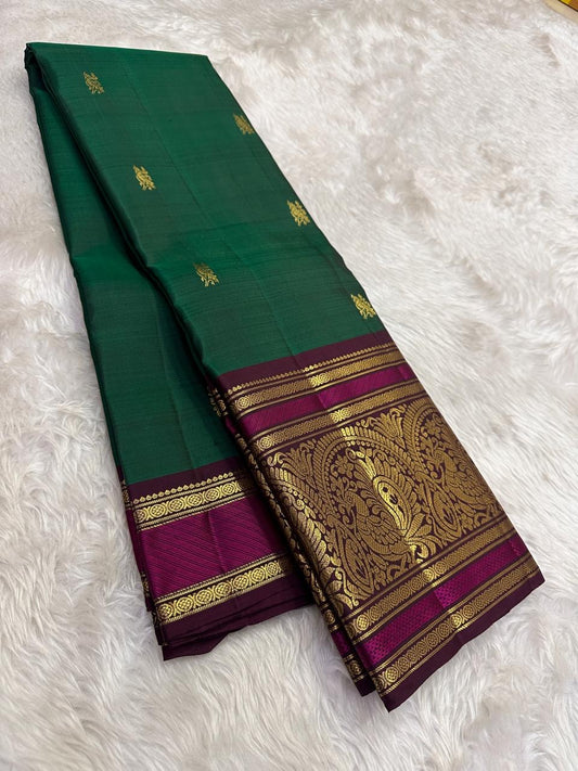 Emerald Green and Magenta Handwoven Pure Silk Kanchipuram Saree with Sorgavaasal Mayil Border