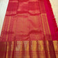 Raspberry Pink pure silk Kanjipuram saree — floral gold zari butta close-up