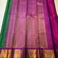 Folded view of forest green and magenta zari kattam KanchiPattu silk saree — Idam Living
