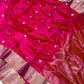 Handwoven fuchsia pink Chanderi saree, silver-gold zari border detail