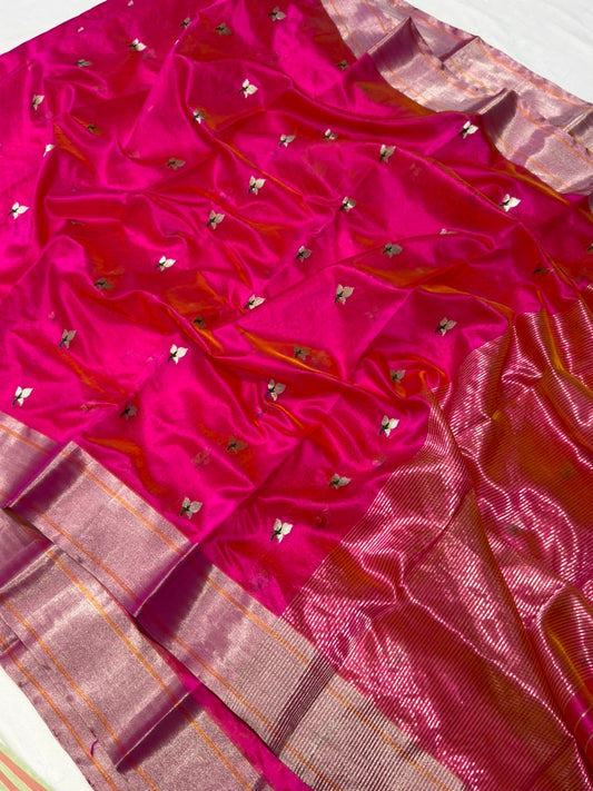Handwoven fuchsia pink Chanderi saree, silver-gold zari border detail