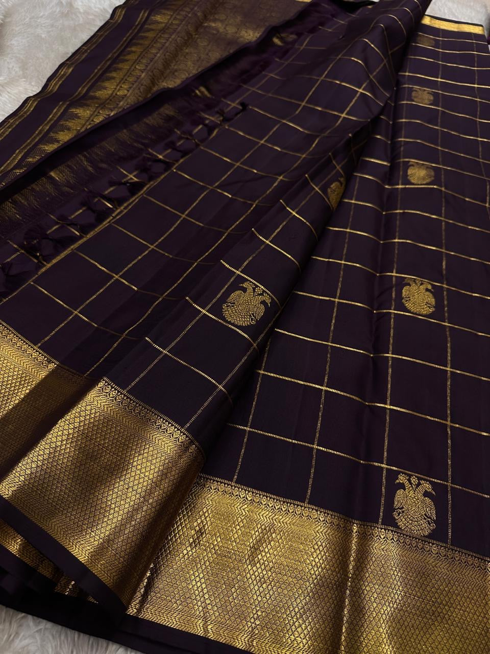 Deep Coffee Brown Kanchipuram silk saree with handwoven Gandaberunda zari motifs, full drape view showing the grand pallu.